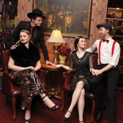 Image of 4 artists in costume